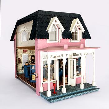 A handmade dolls house later part of the 20th century.