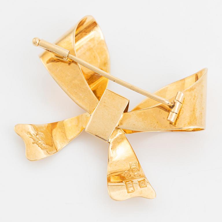 Brooch, bow, 18K gold. Stigbert, Engelbert, Stockholm.