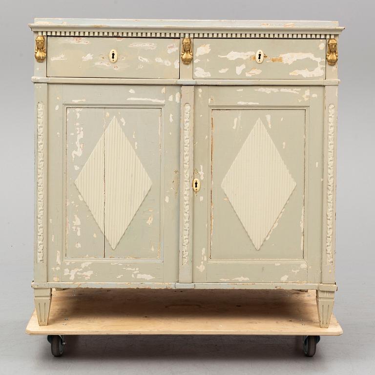 A circa 1800 late Gustavian cupboard.