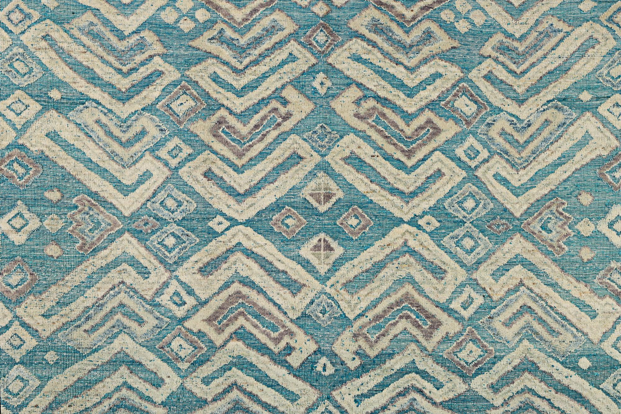 A Moroccan carpet, c. 398 x 200 cm.