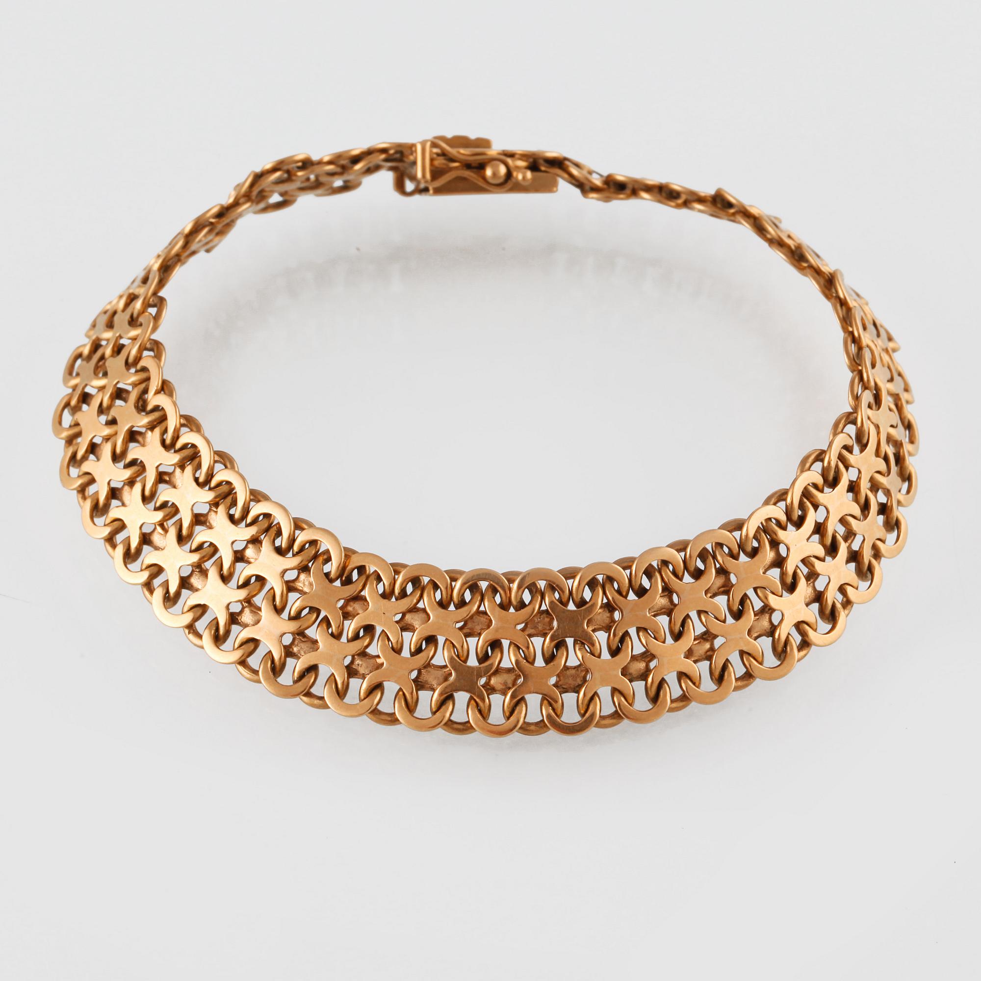 ARMBAND, 18K guld, M.K:S Guldsmedsatelier, Stockholm, 1962. Vikt 28g.