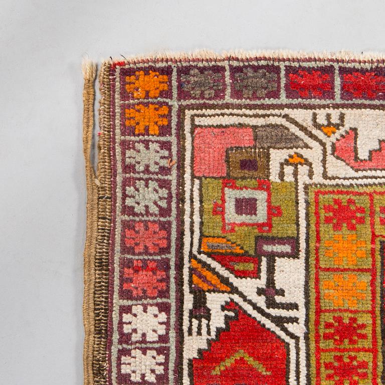 A rug presumably from Karabagh, around 1900. Ca. 305 x 137 cm.