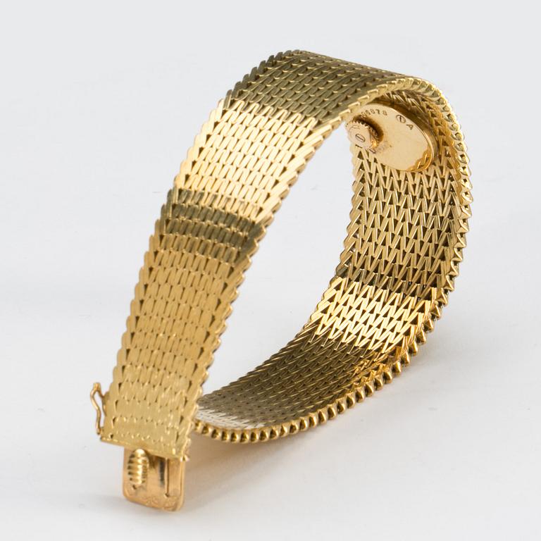 DAMARMBANDSUR, 18 k guld med krans av briljantslipade diamanter ca 0,20 ct, Jaeger le Coultre. Vikt ca 72,5 g.