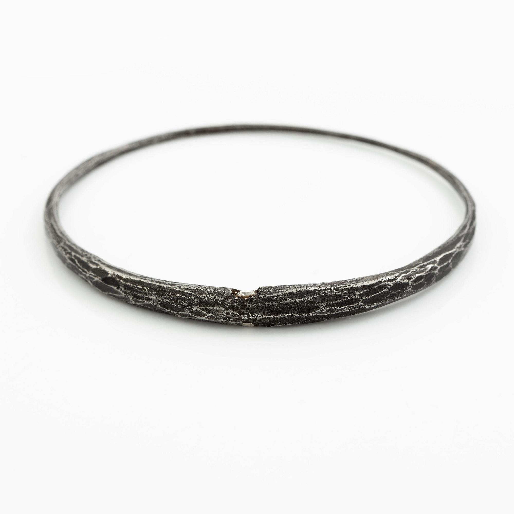 PA Lundahl-Terrs, a necklace and a bracelet, iron and round brilliant-cut diamonds.