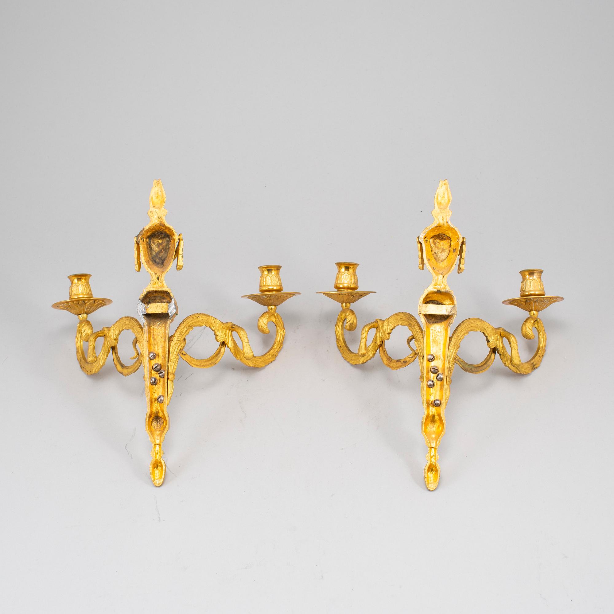 A 20th Century pair of Louis XVI style wall sconces.