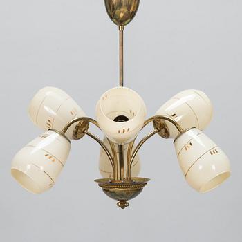 A mid-20th-century brass ceiling light, Finland.