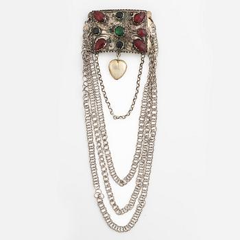 Folk costume jewellery, silver with glass stones.