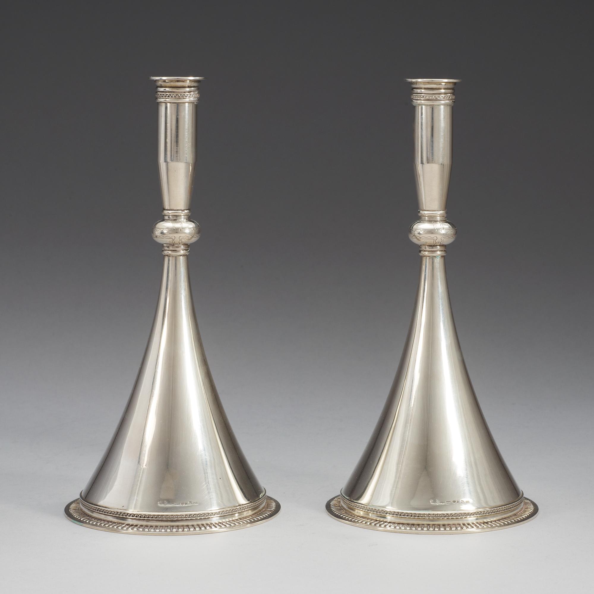 A pair of Wiwen NIlsson sterling candlesticks, Lund 1939.