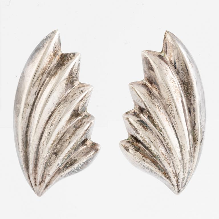 Earrings, silver, in the form of stylised leaves.