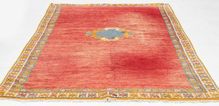 A North African carpet, c. 294 x 198 cm.