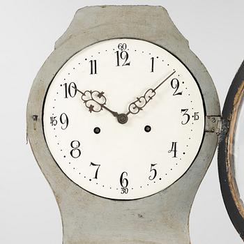 A longcase clock, 19th century.
