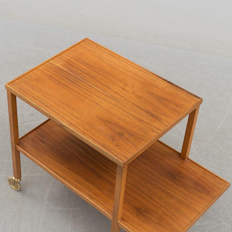 A walnut tea trolley model 470 by Josef Frank for Firma Svenskt Tenn.