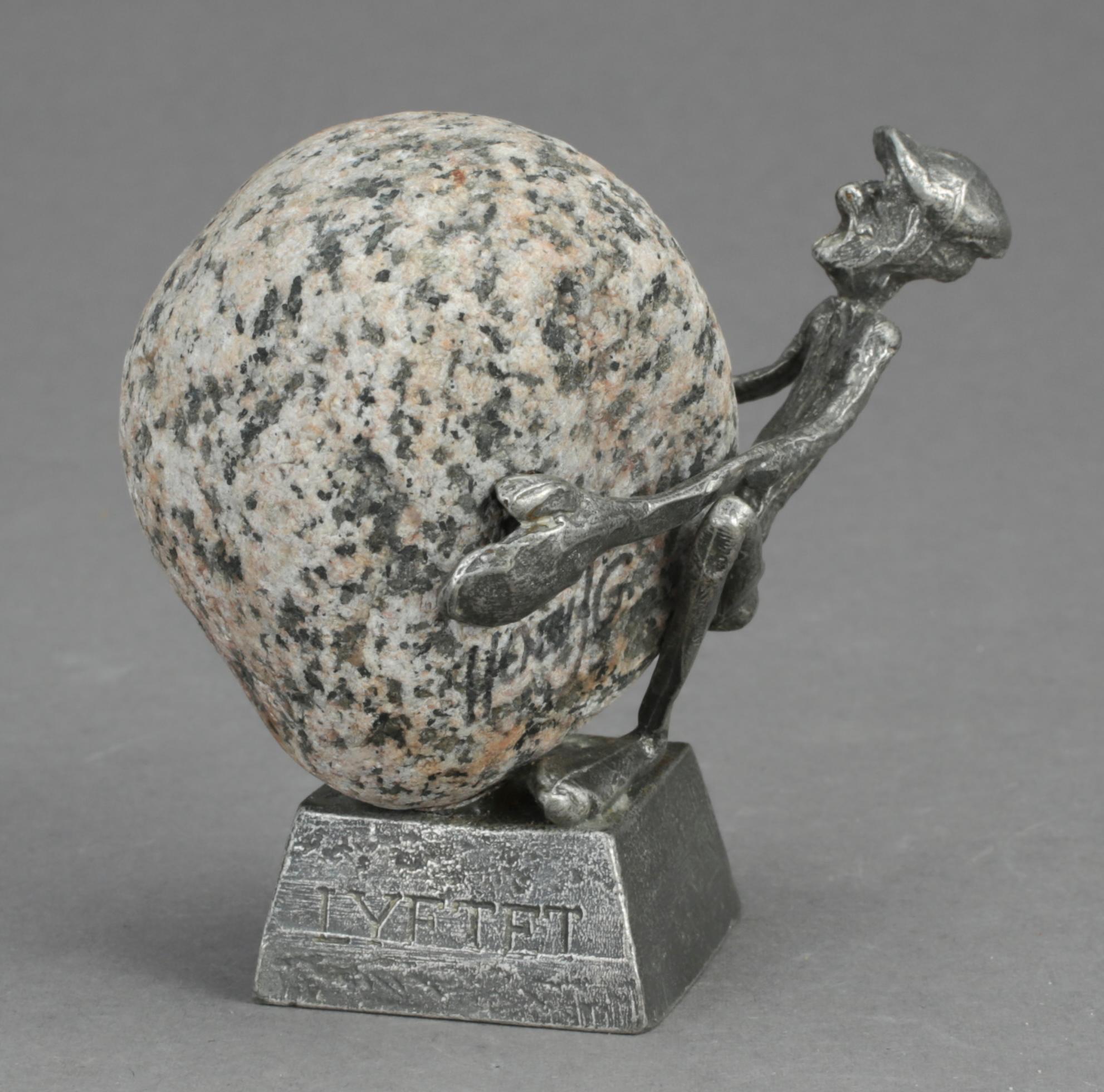 HENRY GUSTAFSSON, skulptur, "Lyftet", tenn och sten, 1991.