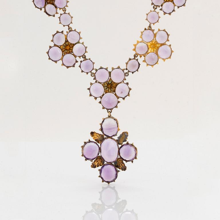 A 14K gold and amethyst necklace.