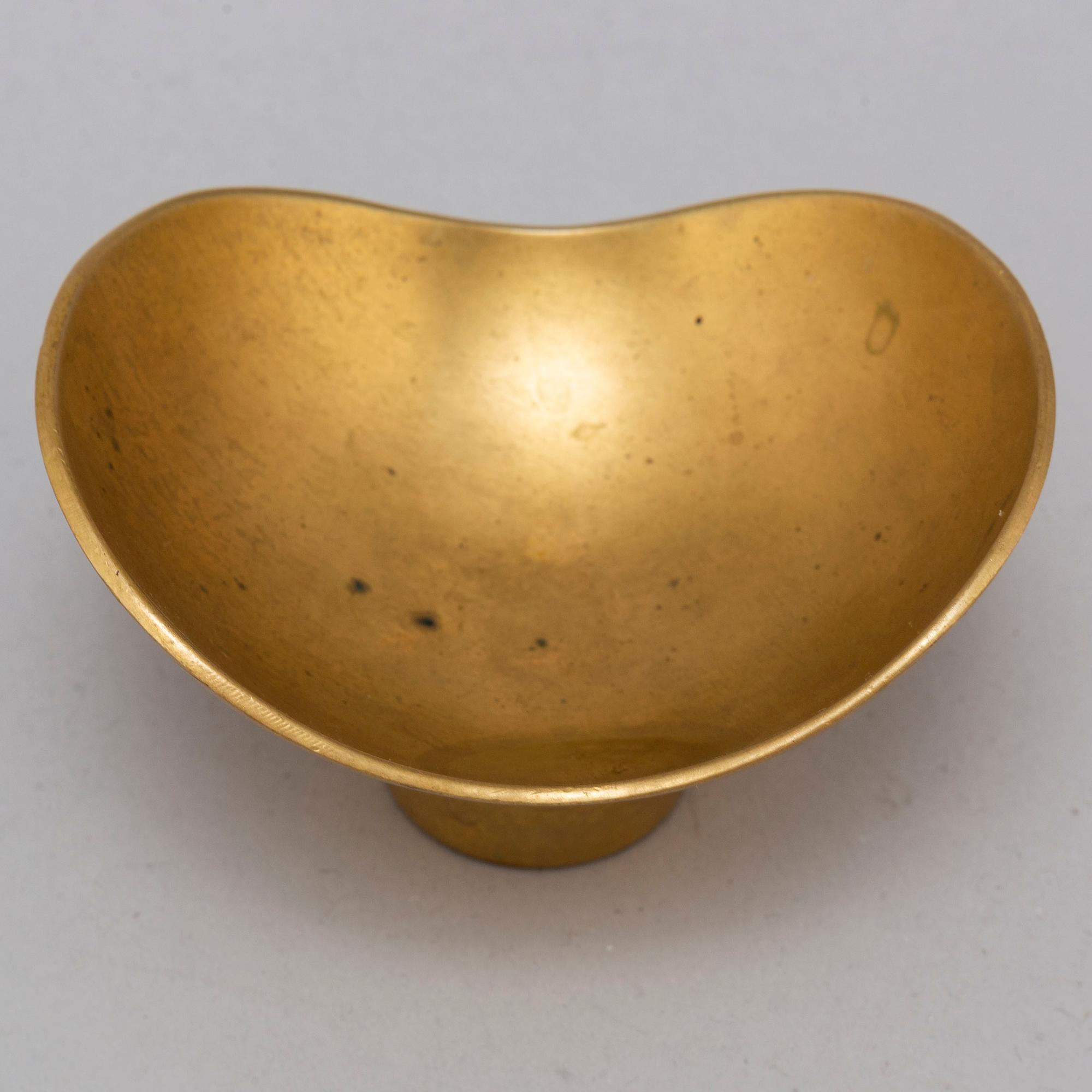 PAAVO TYNELL, a brass bowl.