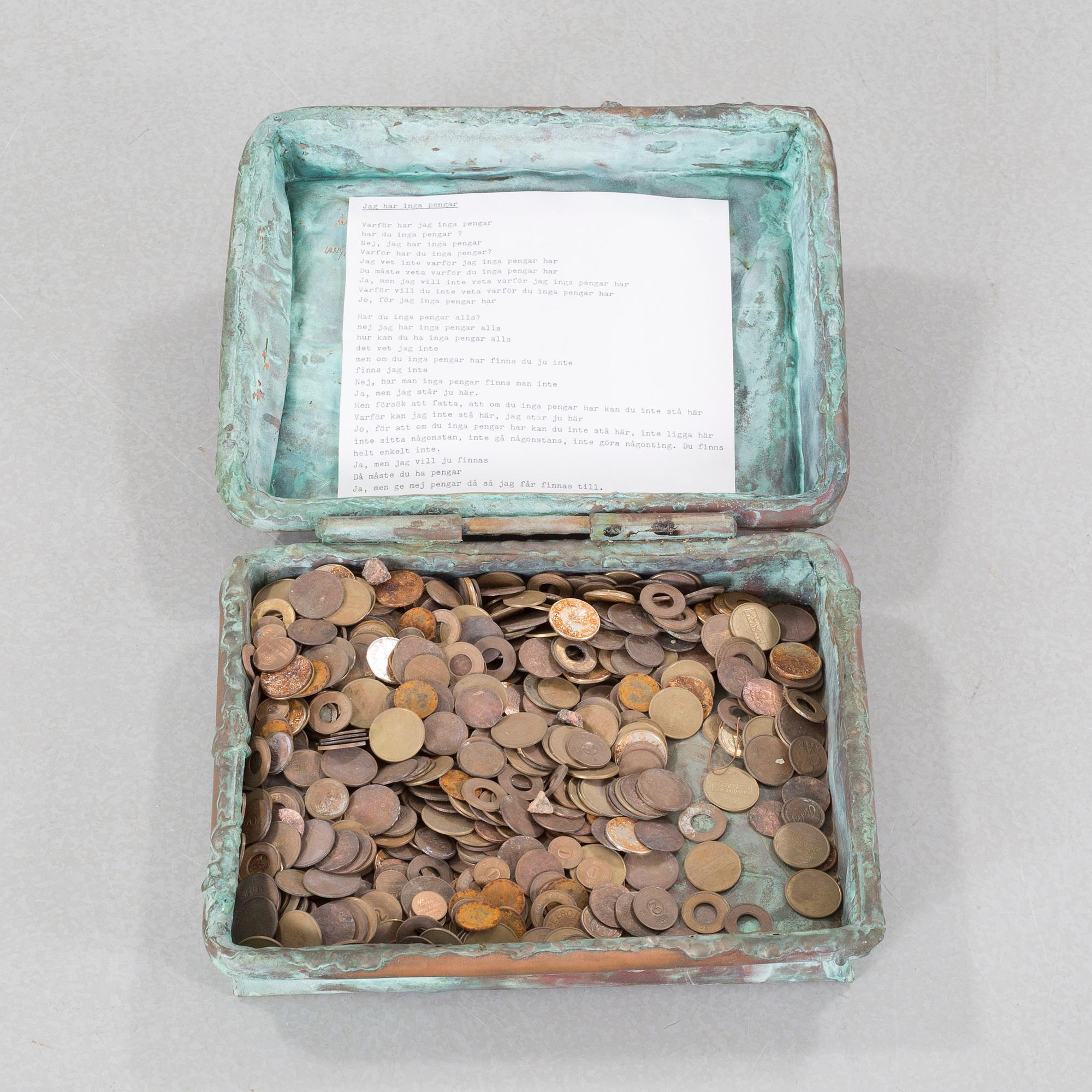 a metal sculpture, signed and dated -83.