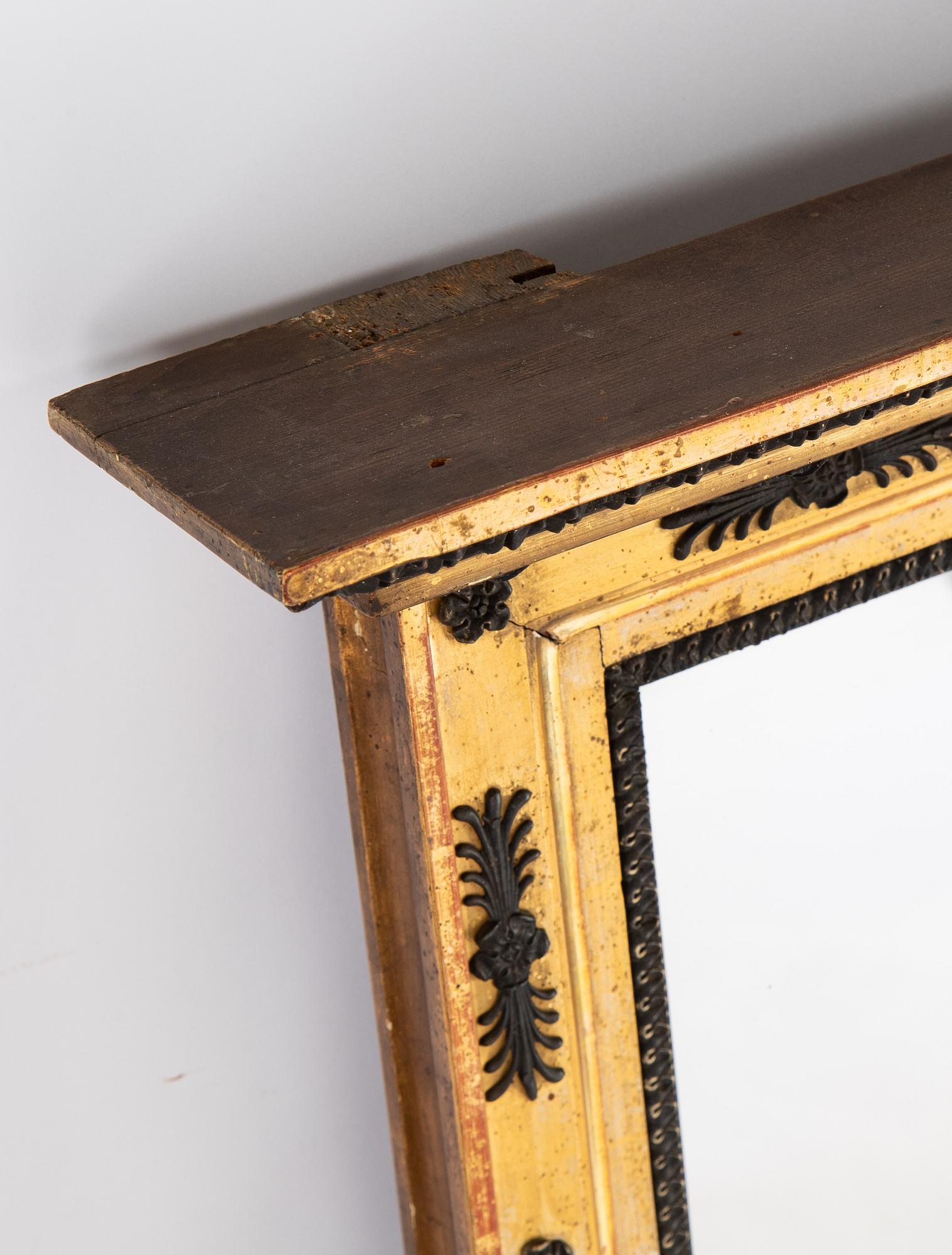 An Empire mirror by Jonas Frisk, (master in Stockholm 1805-1824).