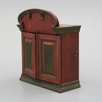 An 1837 cabinet.