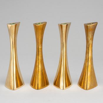 Four brass candle sticks by Karl Erik Ytterberg, 1960's.