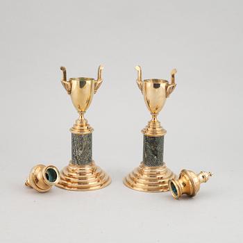 A pair of brass and marble candle holders/casslettes from Skultuna, 20th century.