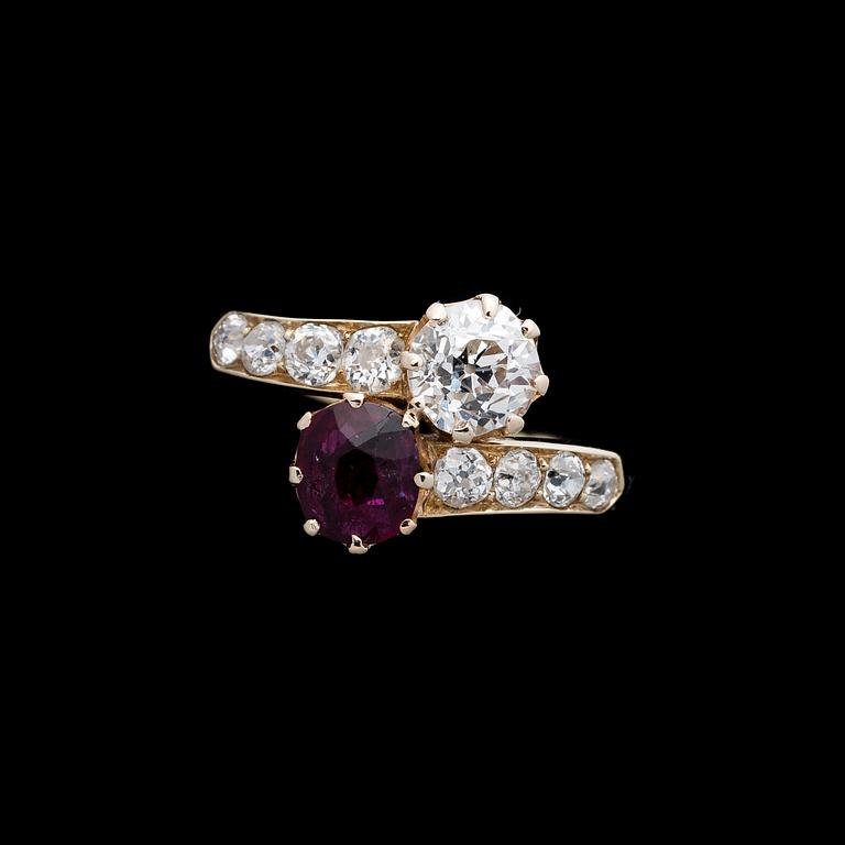 A RING, facetted ruby, brilliant cut diamond, 14K (56) gold.