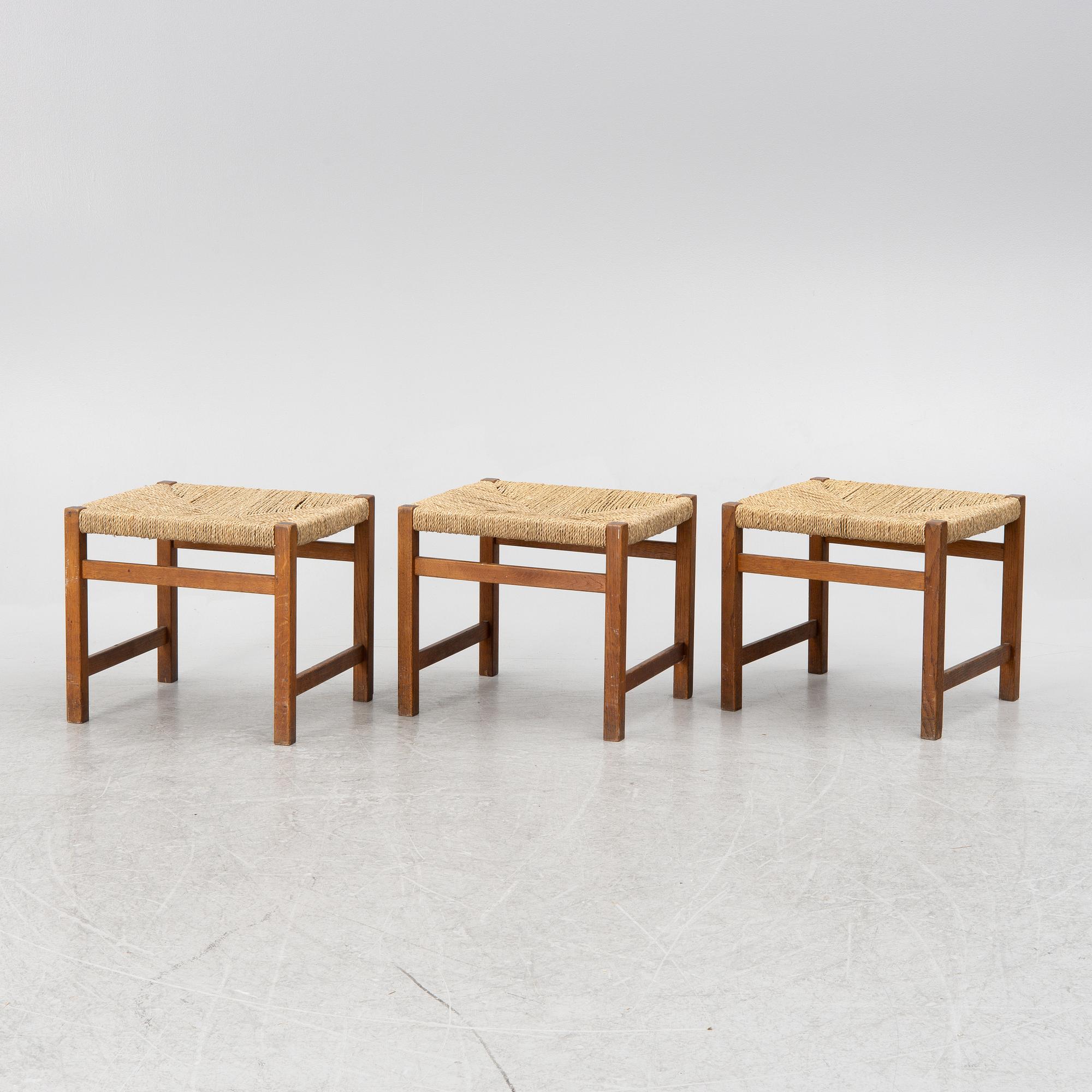 Three oak stools with laced seats, second half of the 20th century.