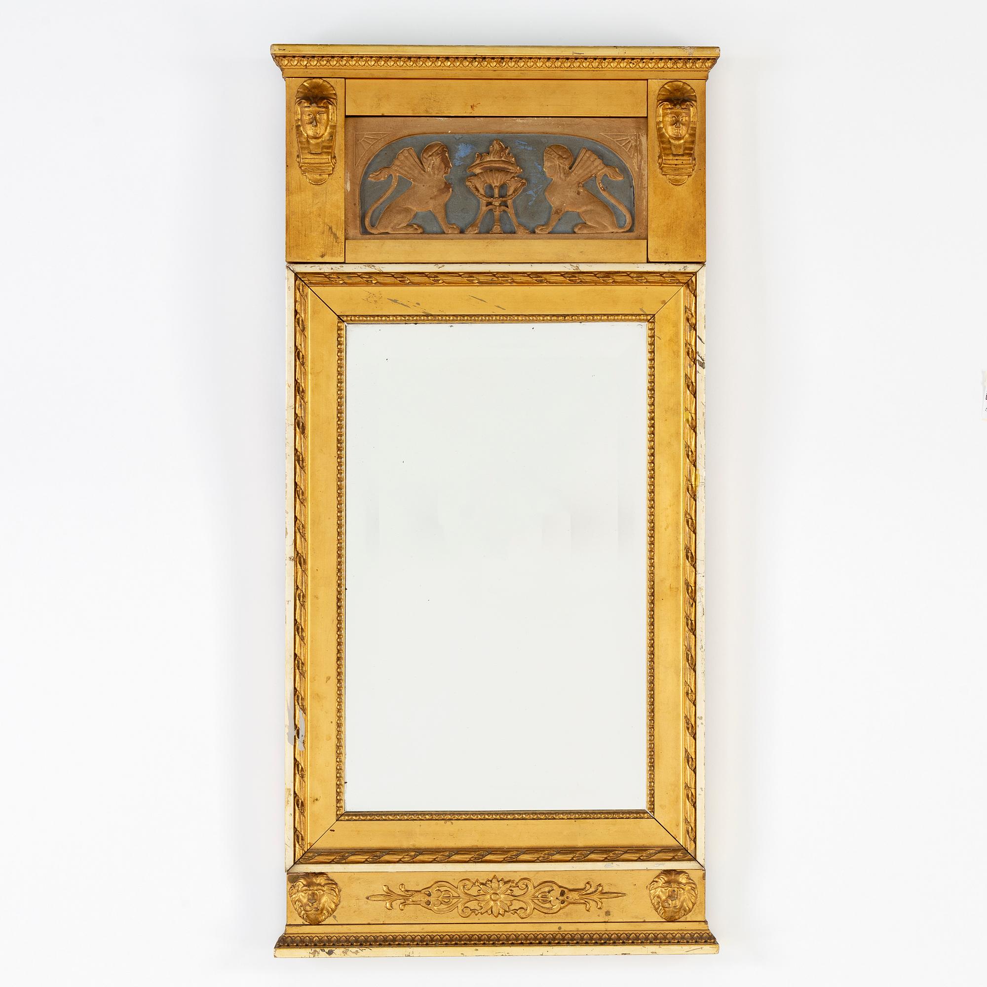 A late gustavian style mirror, ca 1900.