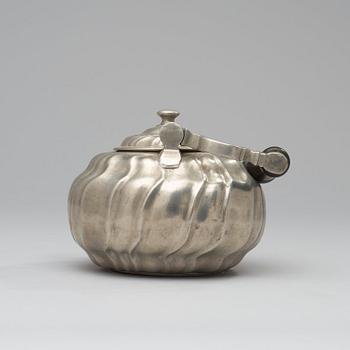 A Rococo pewter tea-pot by O Artedius 1760.