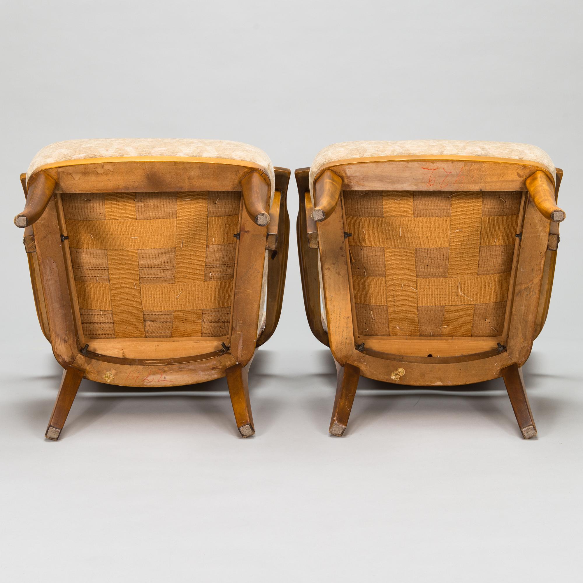 Einari Kyöstilä, a pair of 1940s open armchairs for Oy Stockmann Ab, Keravan Puusepäntehdas, Finland.