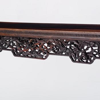 A massive zitan recessed-leg long table 'Jiaotousun Qiotouan', Qing dynasty, 19th century.