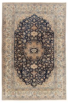 A carpet, semi-antique, part silk Nain, so called 4 Laa, ca 320 x 210,5 cm.