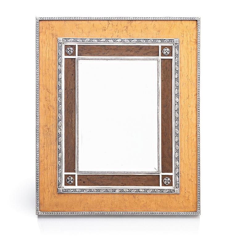 A large Bolin silvermounted natural and stained birch frame, Moscow 1912-1917, by Court Jeweller Wilhem Bolin.