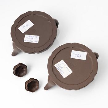 Two similar 'magnolia flower six-petal' yixing teapots, China, 1980s.