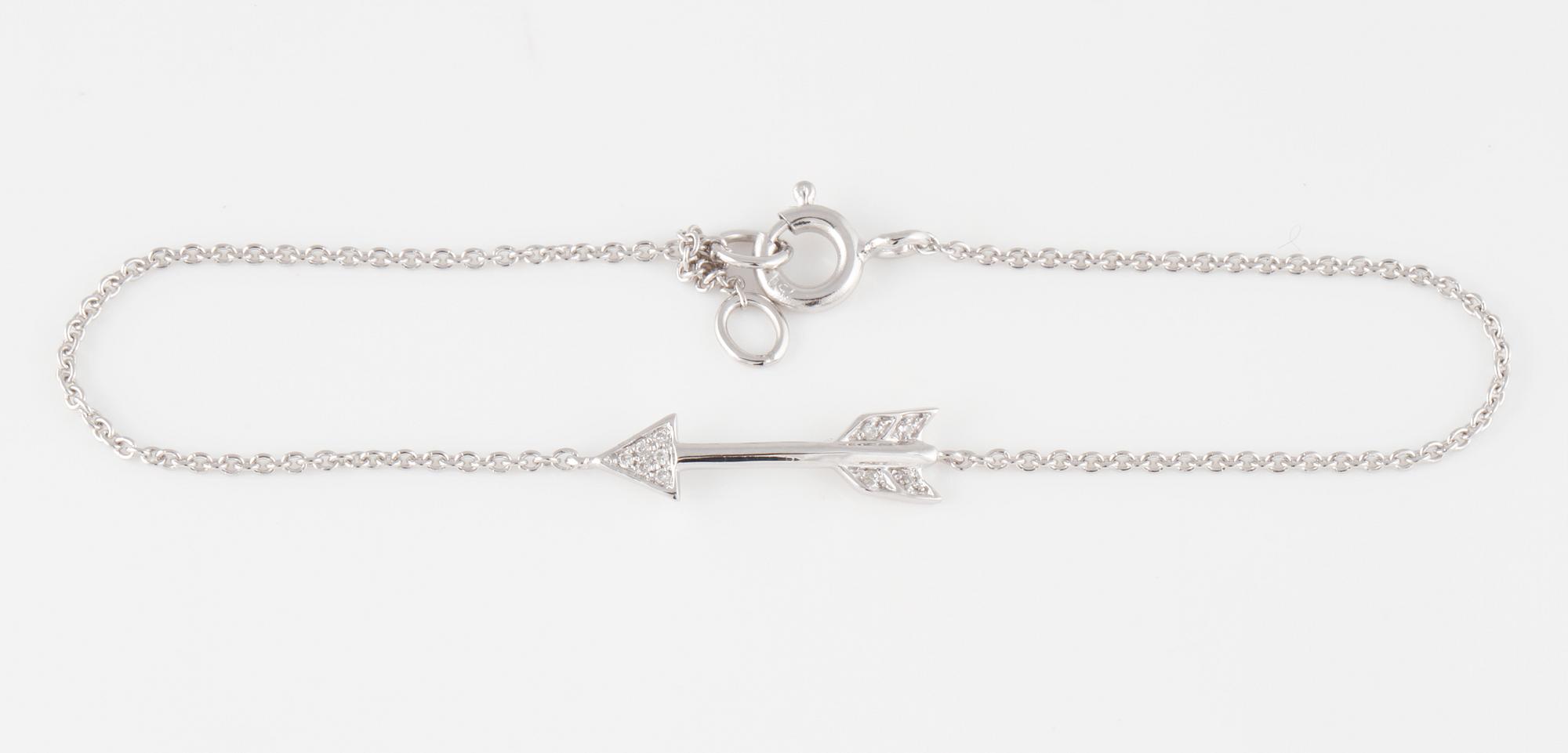 ARMBAND, 18K vitguld med briljantslipade diamanter ca 0.03 ct. Vikt 1,4 gram.