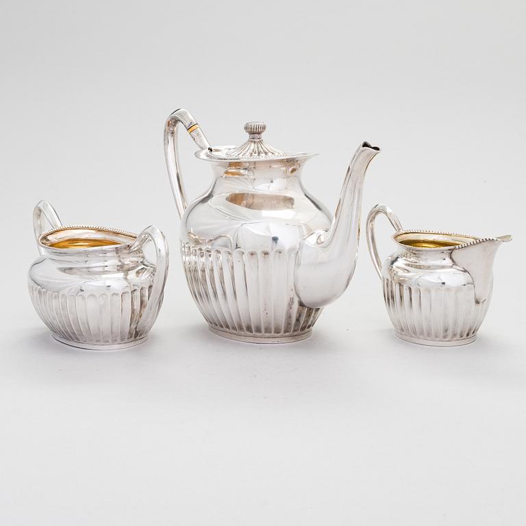 A three-piece gadrooned silver coffee set, Helsinki and Turku 1911 and 1914.