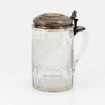 A glass tankard with mount of low fineness silver, 19-20th century.