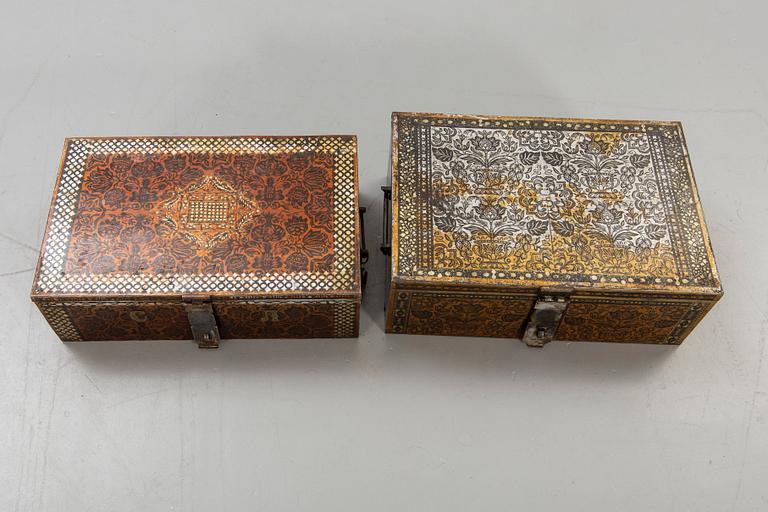 Two perisan metal safety boxes, early 20th Century, one of them with a Russian inkription and dating to 1928.