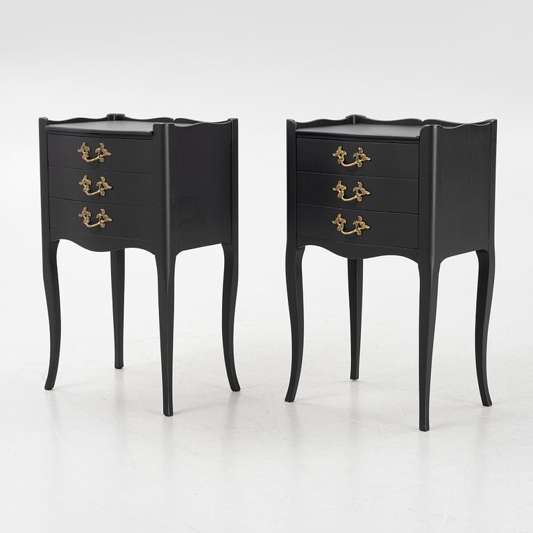 A pair of Rococo style bedside tables, second half of the 20th Century.
