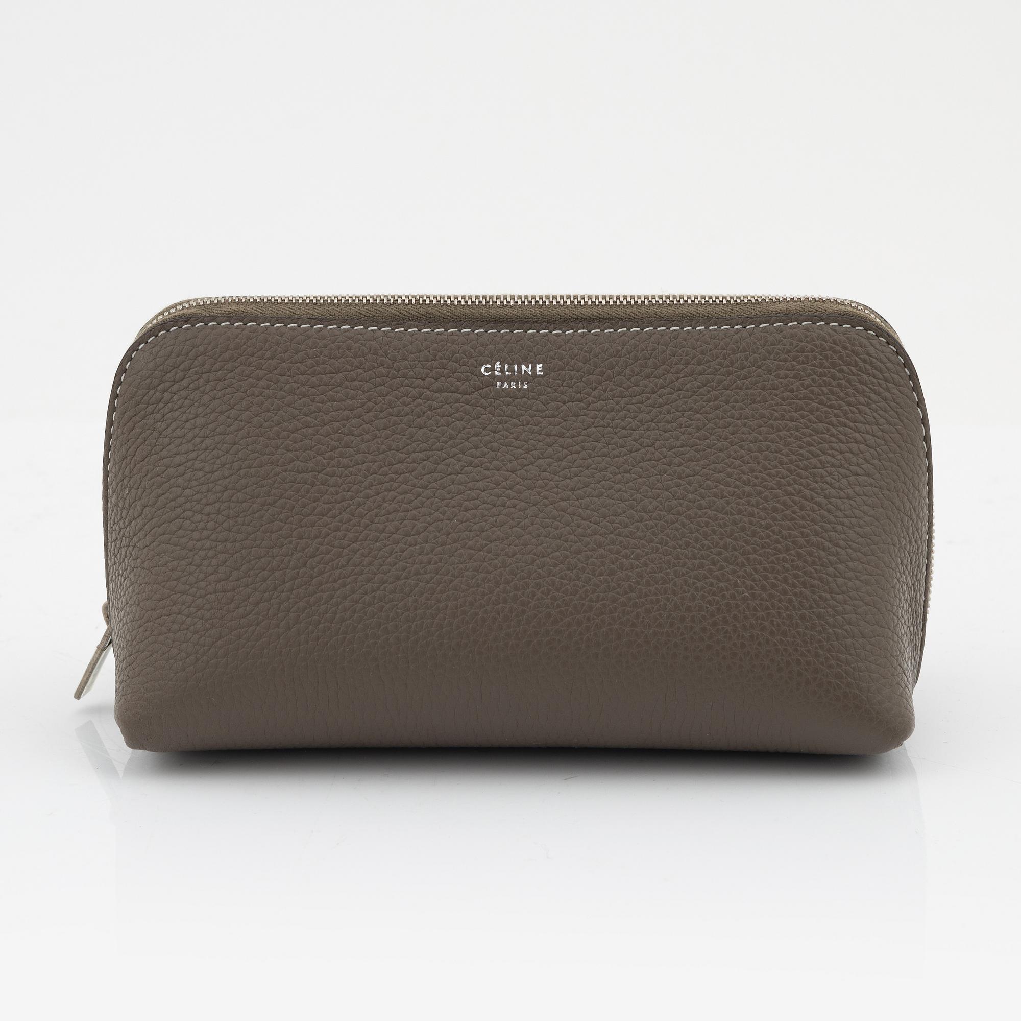 Céline, A small cosmetic pouch in beige leather.