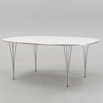 A 'Super elliptical' dining table by Bruno Mathsson & Piet Hein for Fritz Hansen, dated 1995.