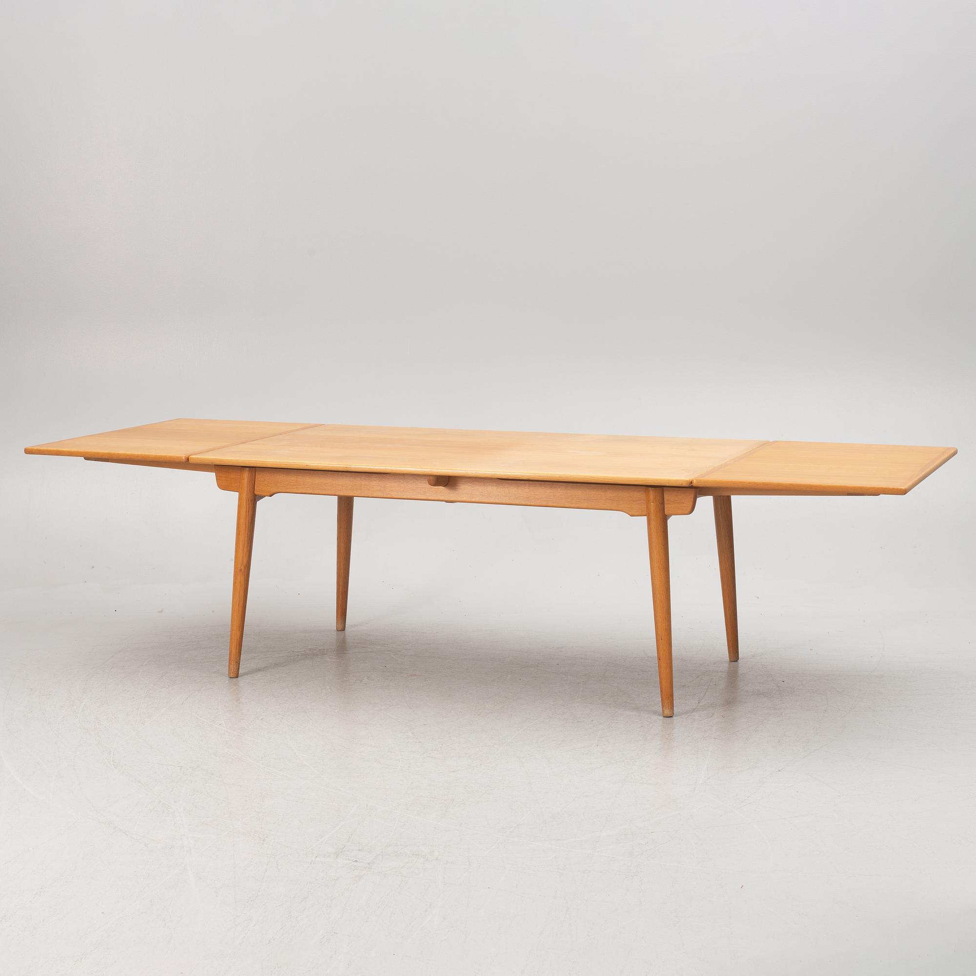 Hans J. Wegner, a model "AT-312", dining table, Anders Tuck, Denmark, 1960's.