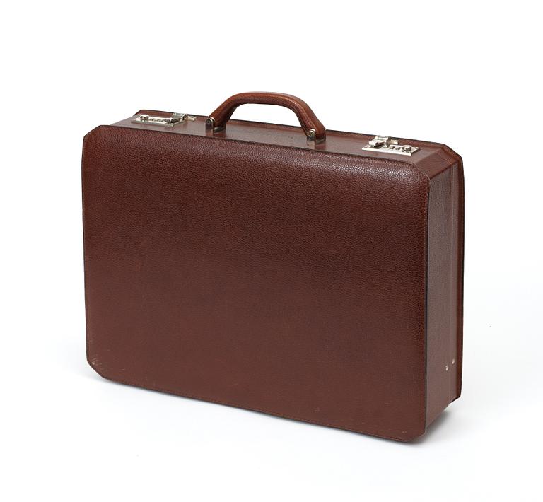 A brown embossed leather briefcase by Salvatore Ferragamo.