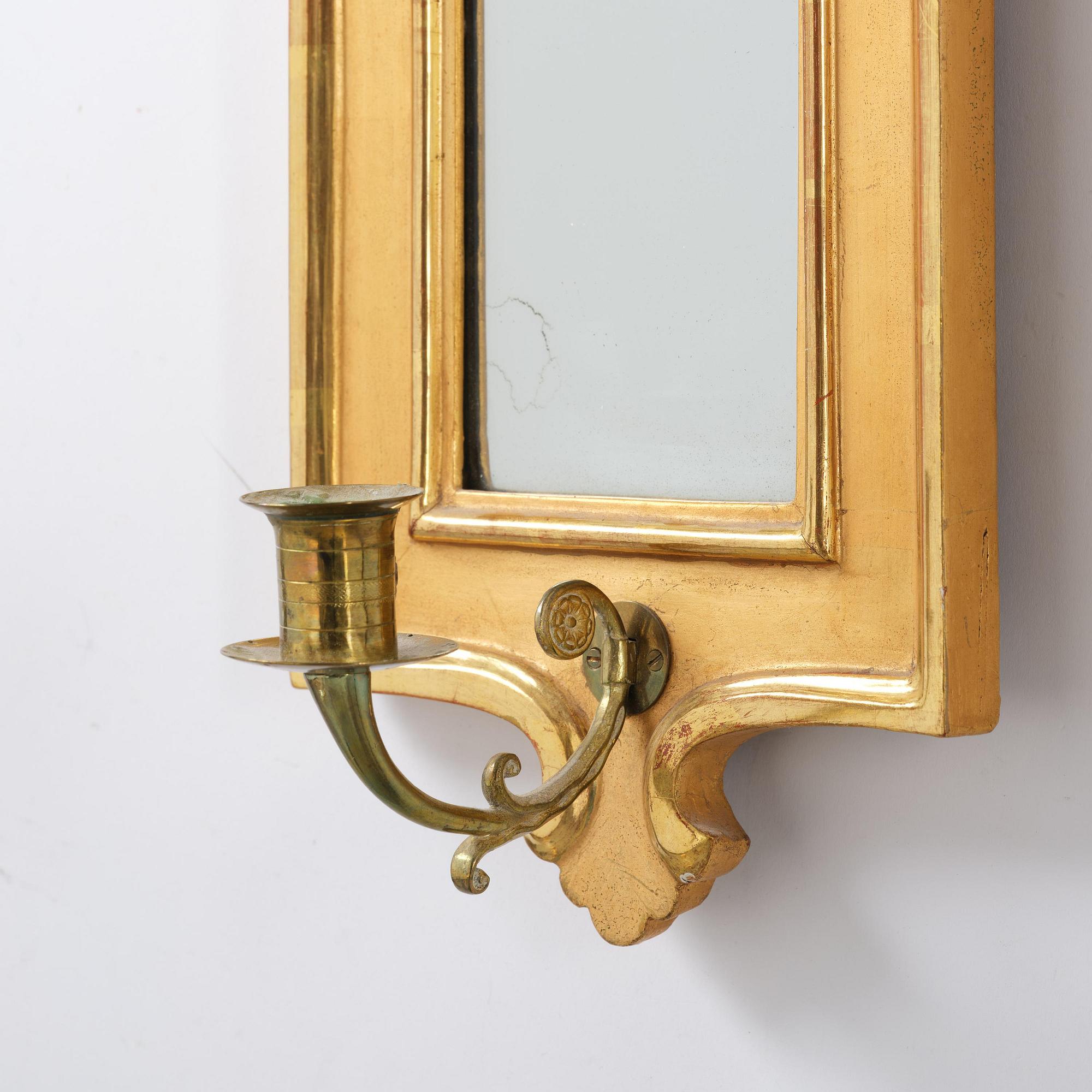 A pair of Gustavian giltwood one-light girandoles by J. P. Helin (master in Stockholm 1763-94).