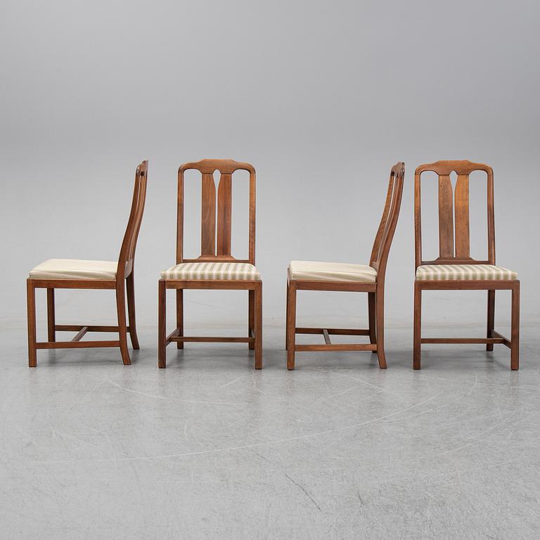Carl Malmsten, A five-piece walnut 'Ambassadör' dining suite by Carl Malmsten.