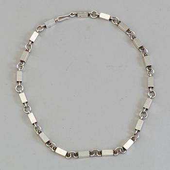 A silver necklace by WIWEN NILSON, Lund, 1963.