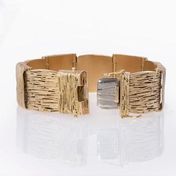 ARMBAND, 18K guld, svenska kontrollstämplar. Vikt 79,6 g.