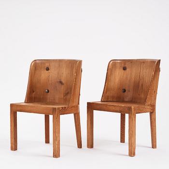 Axel Einar Hjorth, a pair of "Lovö" stained pine armchairs, Nordiska Kompaniet 1930s.