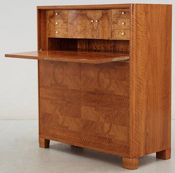 A walnut secretaire attributed to Carl Bergsten, Sweden 1920-30's.