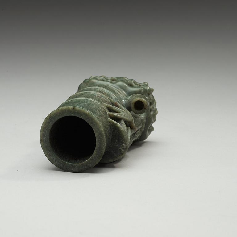 A green stone brush pot, China, 20th Century.