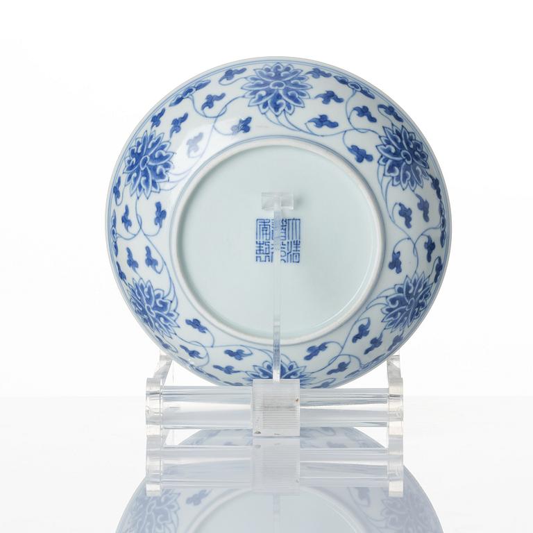 A set of nine blue and white lotus dishes, Qing dynasty with Daoguang seal mark.